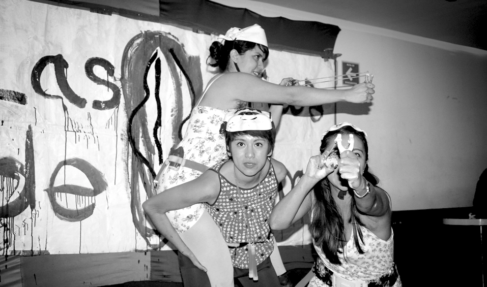 The Hijas de Violencia fight street harassment with the aid of feminine dresses and toy weapons. Photo: Caitlin Donohue/Nark Magazine